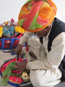 Sarvaan fixing the dancer's hips